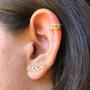 Imagem de Brinco Ear Cuff Mini Coracoes Vados Folheado Em Ouro 18K