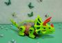 Imagem de Brinquedo Bate e Volta Colecao Dino DM Toys Dinossauro Triceratops com Movimento Luz Som Engrenagens Verde Neon
