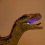 Imagem de Brinquedo dinossauro de controle remoto com luz articulado