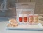 Imagem de CAIXA COM 14 Kit  Amenities Boas Vindas com 6 itens Pitanga Marca Realgems