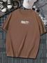 Imagem de Camiseta Branca Masculina Oversize Marrom Frase Desenhos Estampada