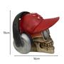 Imagem de Caveira Decorativo Para Decoração Crânio Enfeite Boné e Fone Grande Skull Halloween Esqueleto de Resina