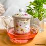 Imagem de Chaleira Vidro e Porcelana 350ml c/1 Xícara Cha c/Pires 200ml Flores
