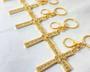 Imagem de Chaveiro mosquetão dourado cruz grande stras religioso santo