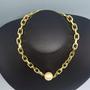 Imagem de Chocker com elo redondo  banhado a ouro 18 k e pérola shell