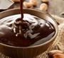 Imagem de Chocolate Sicao Mais Gotas 1,01kg Meio Amargo derretimento