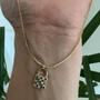 Imagem de Colar pingente cravejado com micro zircônia banhado a ouro 18k