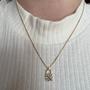 Imagem de Colar pingente cravejado com micro zircônia banhado a ouro 18k