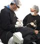 Imagem de Combo Paramentação Cirurgia Odontologica tecido = 1 Campo Paciente 2 Capotes Cirúrgico ( Verde ).