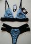 Imagem de Conj. lingerie de renda sem bojo, sem aro, forrado e com tiras de elástico trabalhado contrastante.