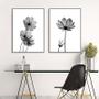 Imagem de Conjunto com 2 quadros decorativos Florais com o fundo branco.