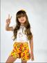 Imagem de Conjunto infantil short e blusa mais arquinho na estampa do short