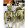 Imagem de Decoração Halloween Esqueletos Realistas Pequenos no Varal pra Enfeitar