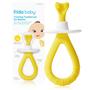 Imagem de Escova de dentes Frida Baby Training para bebês com silicone