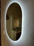 Imagem de Espelho Orgânico Oval Com Led 50x70cm À Pilha