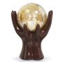 Imagem de Estatueta Enfeite Decoração Mesa Sala Mãos MArrom Escuro Com Esfera Bola Ambar dourada