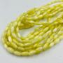 Imagem de Fio de Pedras Arroz 8x4mm 35un Amarelo Claro 30cm Artesanato