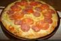 Imagem de Forma de pizza em pedra sabão  de 22 cm