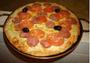 Imagem de Forma de pizza em pedra sabão  de 25 cm sem alças e sem aro