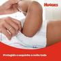 Imagem de Fralda Infantil Huggies Com 32 Tripla Mega Xg