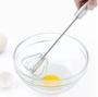Imagem de fuê manual para bater ovos profissional semi automático