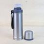 Imagem de Garrafa inox isotérmica com acionamento click 670ml
