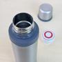 Imagem de Garrafa inox isotérmica com acionamento click 670ml