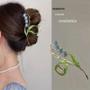 Imagem de Grampo de Cabelo Orquídea Grande Sino - Design Premium com Toque Zero