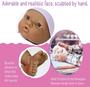 Imagem de JC Toys La Newborn Newborn Gift Set Hispanic 12"" Life-Like Posable Vinyl Newborn Doll c/ Acessórios  Roxo  impermeável Idades 2+" (18347)