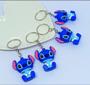 Imagem de Kit Bolsa Infantil Menina Mini Bag Disney Lilo Stitch Alça Mão Pérolas + Chaveiro com Boneco Miniatura Stiitch 3D Moda
