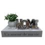 Imagem de kit livro decorativo, mini vaso de cerâmica e palavra HOME