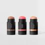 Imagem de Kit Mini Contorno Bastão Marrom Médio+Mini Blush Bastão Rosa Claro + Mini Iluminador Bastão Océane Edition (3 Produtos)