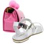 Imagem de Kit Sandalia Rasteira Infantil Menina Macia Leve Prata Tira Strass E Bolsa Pompom Moderna Delicada