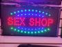 Imagem de letreiro led placa Luminoso escrito Sex shop led piscando