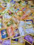 Imagem de Lote com 40 Cartas Pokémon - 1ª Geração (Base, Jungle, Fossil, Team Rocket)