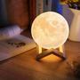 Imagem de Luminária Lua Cheia 3 D Caixa De Som Bluetooth Ambiente