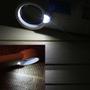 Imagem de Lupa de Mão Com Luz 2 Leds com lanterna amplicação 12X CBRN01606