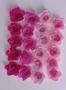 Imagem de Pacote com 100 unidades Flores de papel para topo de  bolo e lembrancinhas rosa pink
