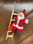 Imagem de Papai Noel Subindo as escadas Decoração de Natal 