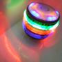 Imagem de Pião de brinquedo com luz e som flashing peg-top