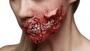 Imagem de Prótese Ferida boca exposta de látex + látex + sangue falso