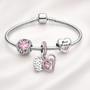 Imagem de Pulseira com Berloque de Coração e Pedra Rosa Mãe .
