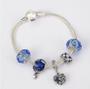 Imagem de Pulseira com Berloques de Prata e Pedras Azul 