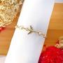 Imagem de Pulseira com Pingente de Avião e Perolas Folheado em Ouro 18K Softjoias
