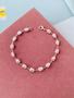 Pulseira de pérolas orgânicas barrocas em Semi Joia Prata 925 Verniz Diamond - Dondocas.Bijus Imagem de Pulseira de pérolas orgânicas barrocas em Semi Joia Prata 925 Verniz Diamond