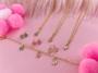 Imagem de Pulseira Kids Florzinhas Três Cores De Resina Folheado Dourada