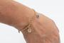 Imagem de Pulseira Mão de Fátima Cravejada e Olhos Gregos Banhado em Ouro 18K