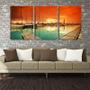 Imagem de Quadro Decorativo 45x96 barcos ancorados sol céu vermelho