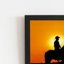 Imagem de Quadro Homem Montado Cavalo Pôr Sol Moldura Preta 60X40Cm