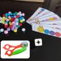 Imagem de recurso pedagógico montessori tesoura bola + pinça + pompom + pareamento cores lagarta